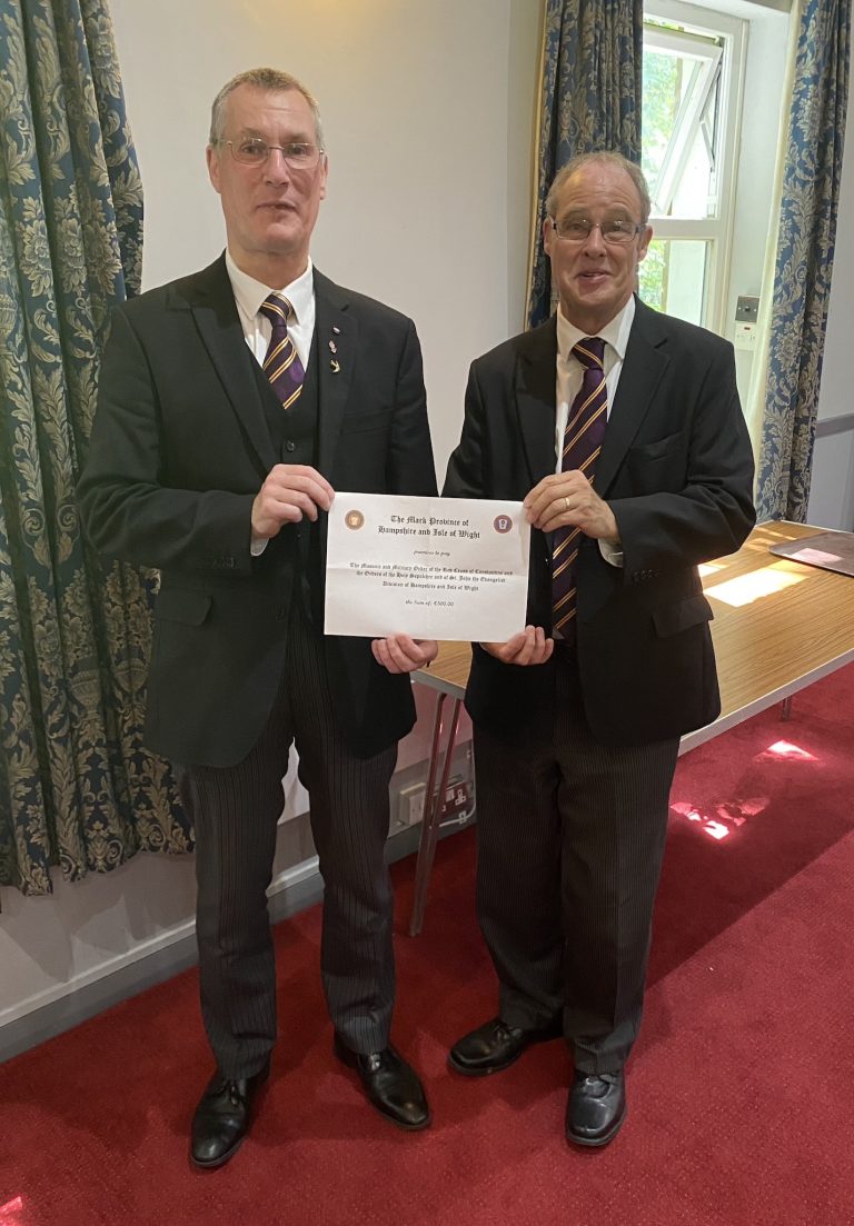 DPGM of Mark Master Masons presenting cheque to Intendant General