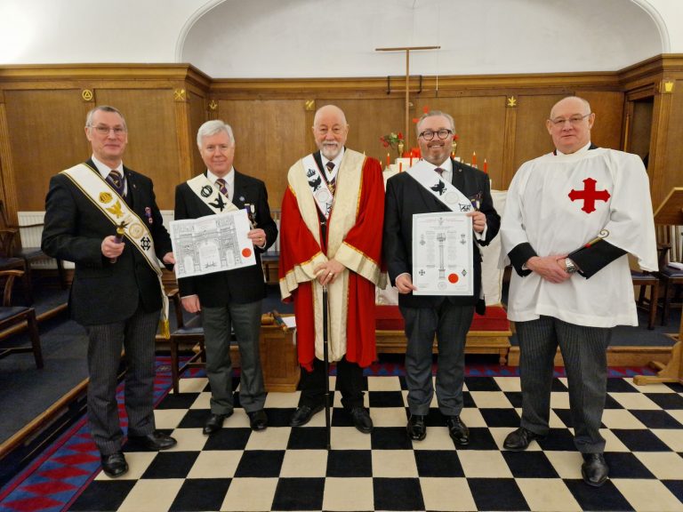 Members receiving their Red Cross and Appendant Orders Certificates